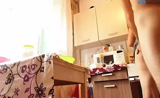MILF receives anal from behind in the kitchen